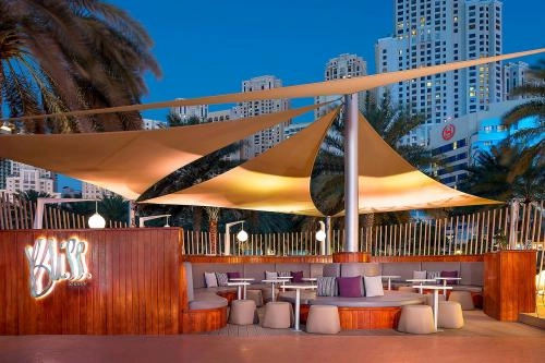 Отель Sheraton Jumeirah Beach Resort 5* в Дубаи: Прибрежный отель , Комфортные номера , Детский клуб , Турецкий хамам , Фитнес зал ,