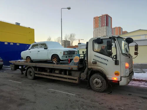 Эвакуация автомобилей Помогаторъ в Екатеринбурге: Подвоз Топлива, Запуск Двигателя, Замена Колес, Заряд Аккумулятора, Отогрев Автомобиля, Междугородные Перевозки, Прикур Автомобиля,