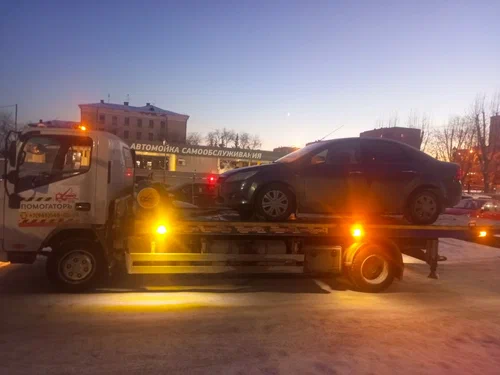 Эвакуация автомобилей Помогаторъ в Екатеринбурге: Подвоз Топлива, Запуск Двигателя, Замена Колес, Заряд Аккумулятора, Отогрев Автомобиля, Междугородные Перевозки, Прикур Автомобиля,